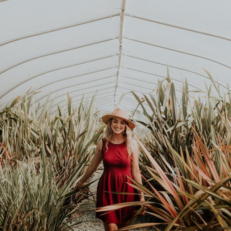 Amina Rao, Lead Design Curator at Sunbeam Breeze Anchor, reviewing corporate floral arrangements